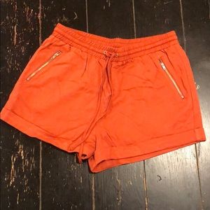 Orange stretch shorts
